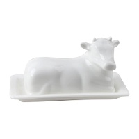 Weiße Butterdose in Kuhform